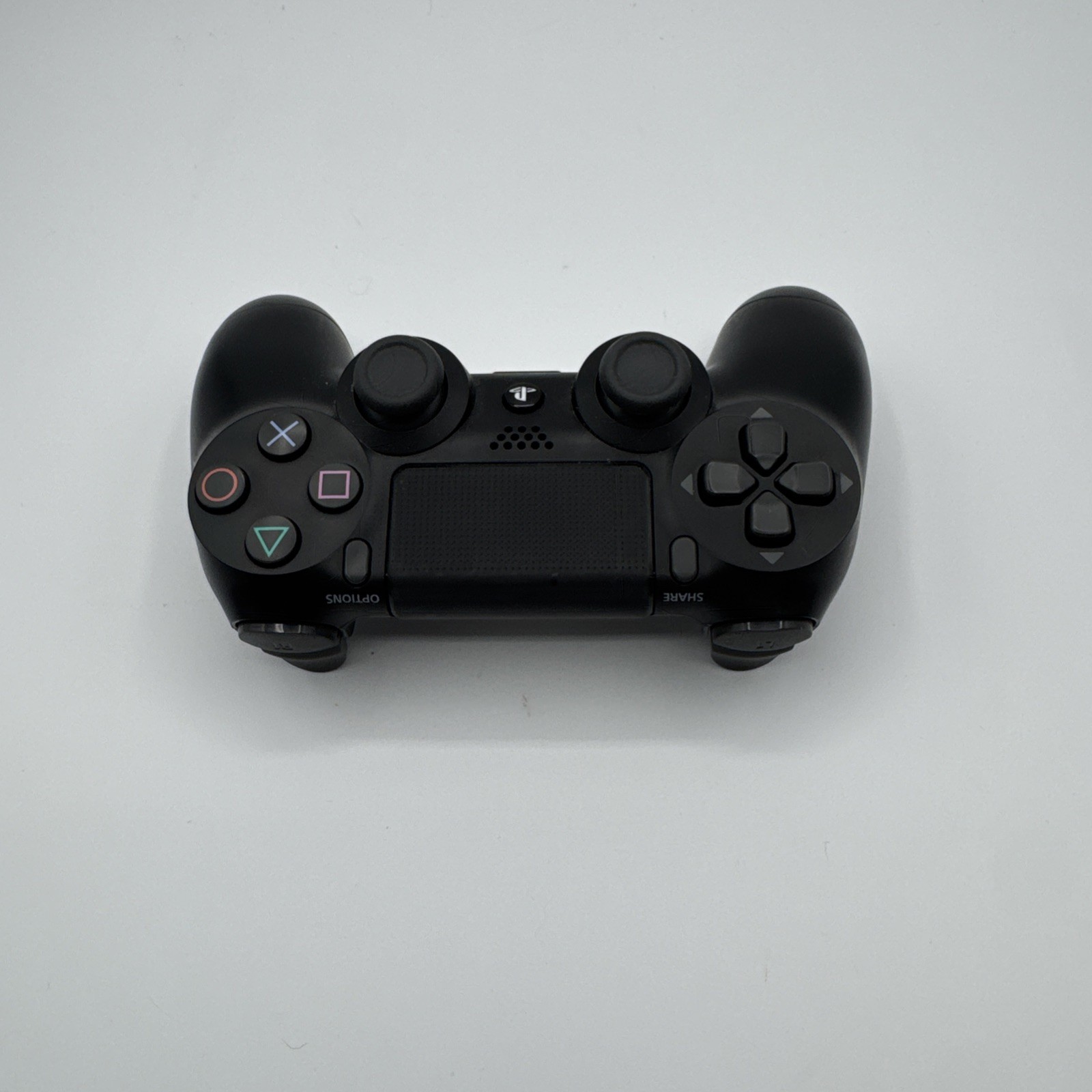 DualShock 4 Wireless Controller - Black - PlayStation 4 — photo 3